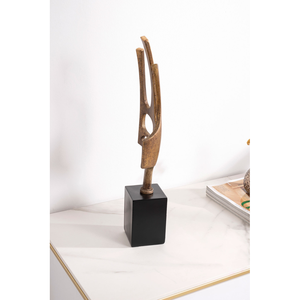Escultura polyresina, oro envejecido, base negro. 13x45x8 cm